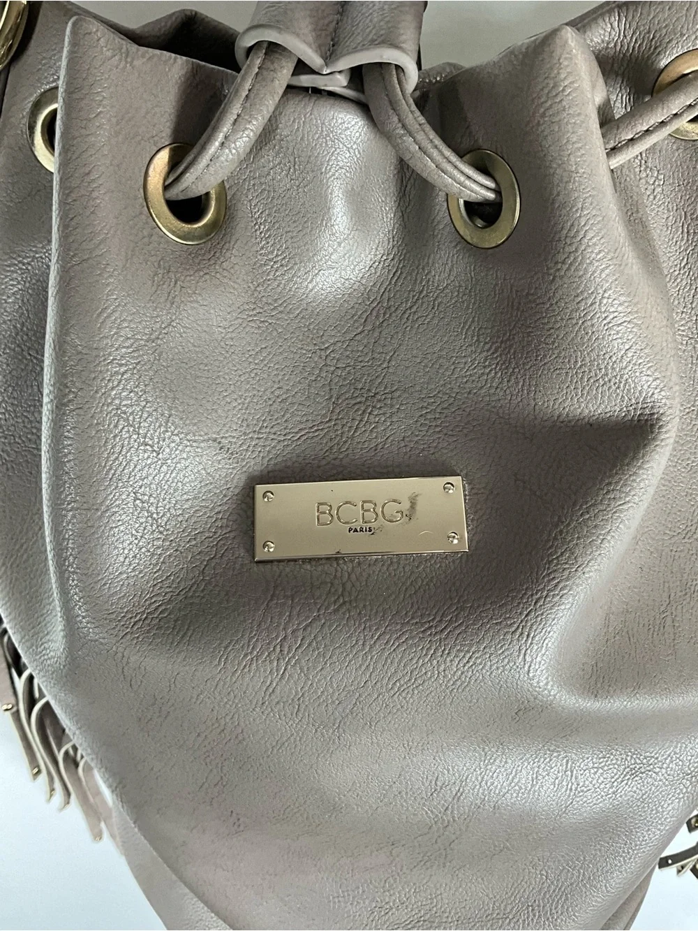 BCBG Paris Bucket Bag Taupe Fringe Drawstring Hobo Bag